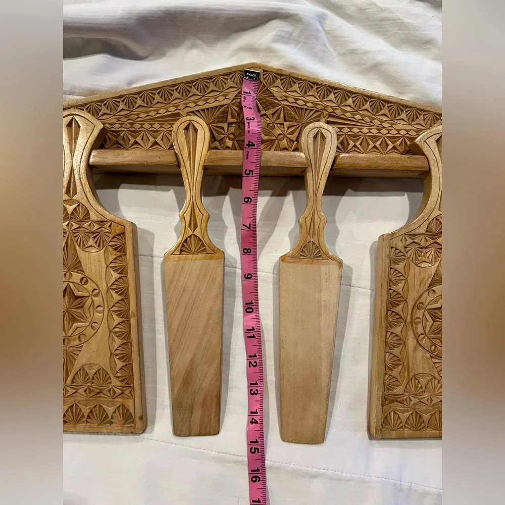 Handcrafted Wooden Wall Decor with Intricate Carvings
